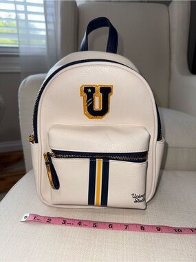 Universal Cream Backpack with Navy & Yellow Lining